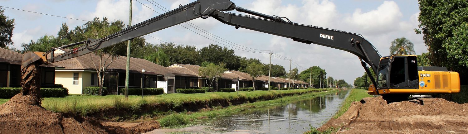 Equipment working on canal dredging