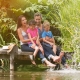 Parents and children by canal