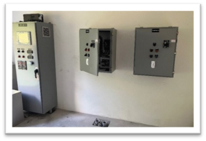 Control panels on wall to operate the water control structure