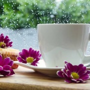Coffee cup with flower on a table