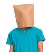 man with a brown bag over his head