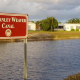 C. Stanley Weaver Canal sign at bank of canal