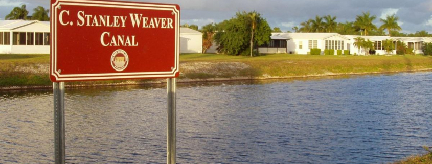 C. Stanley Weaver Canal sign at bank of canal