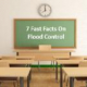 school back-board with text "7 Fast Facts on Flood Control"